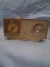 Vintage General Electric Model C-545A-AM Vacuum Tube Clock Radio-ivory. Fixed Price $65.00.