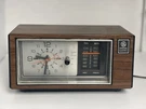 Vintage General Electric 7-4550C Walnut Grain Polystyrene Clock Radio Tested. Fixed Price $14.00.