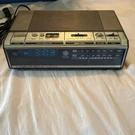 7-4774A Vintage Am/fm Digital Clock Radio, Alarm, Snooze, Brown. Fixed Price $15.00.