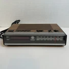 Vtg. General Electric Am/fm Alarm Clock Radio Model 7-4624B Wood Grain- Works. Fixed Price $32.00.
