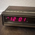 Sears Digital Alarm Radio Clock 317.23210 250 Woodgrain Plastic. Fixed Price $5.00.
