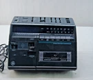 Vintage General Electric 7-4970A Alarmclock Fm/am Radio, Cassette Player. Fixed Price $28.00.
